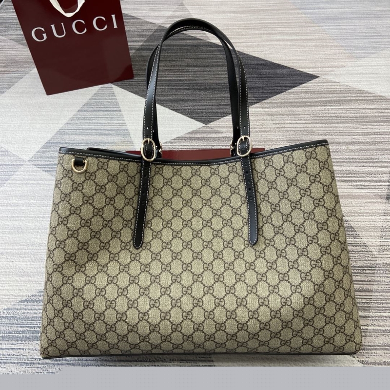G*u*i shopping bags